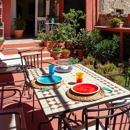 Genius Loci Cozy House With Garden In The Old Town Apartment Olbia